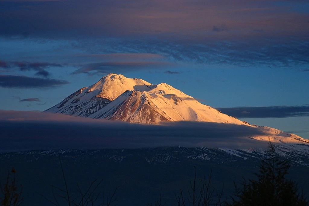 Mount Shasta in northern California, a sacred volcano ringed by forest