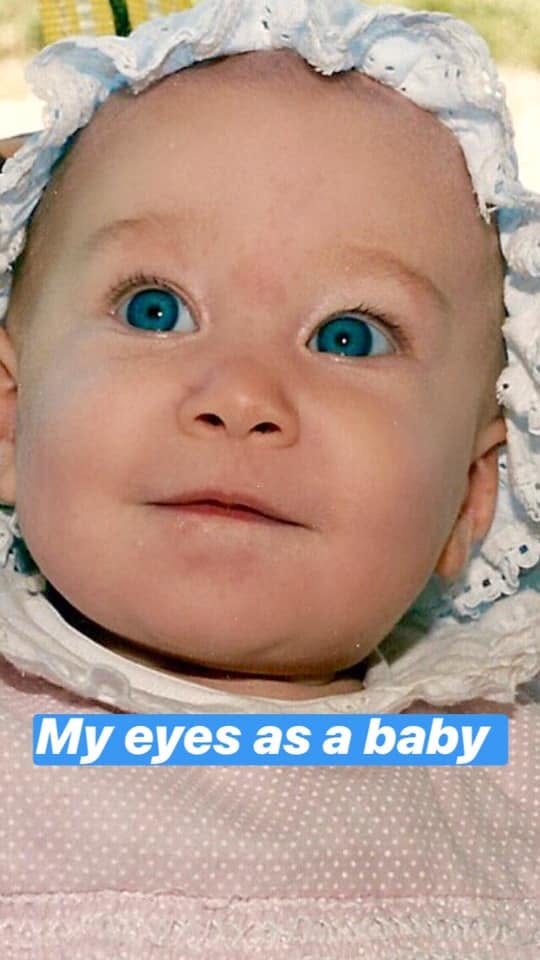 Close-up of Jodie Louise as a baby with wide blue eyes