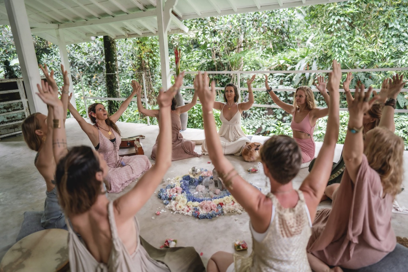 Jodie Louise sitting in circle with women at a workshop
