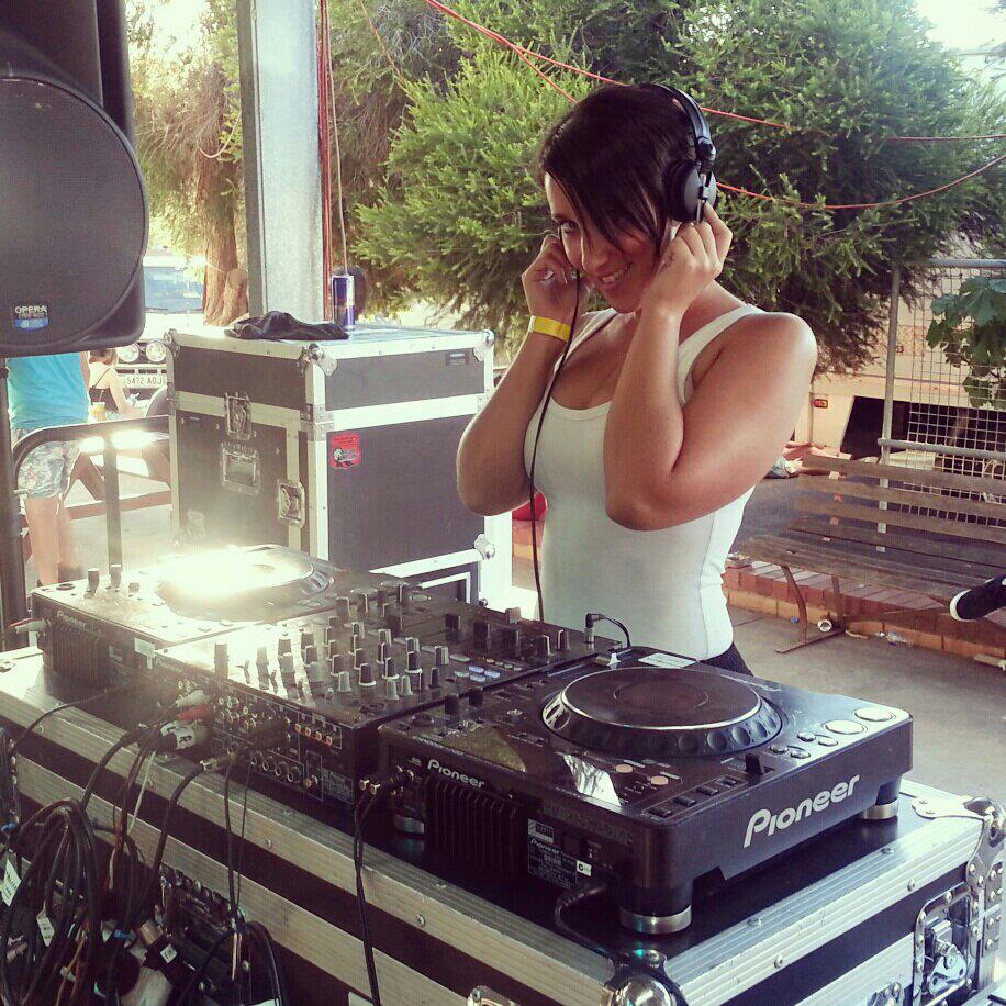 Jodie Louise learning to DJ behind the decks