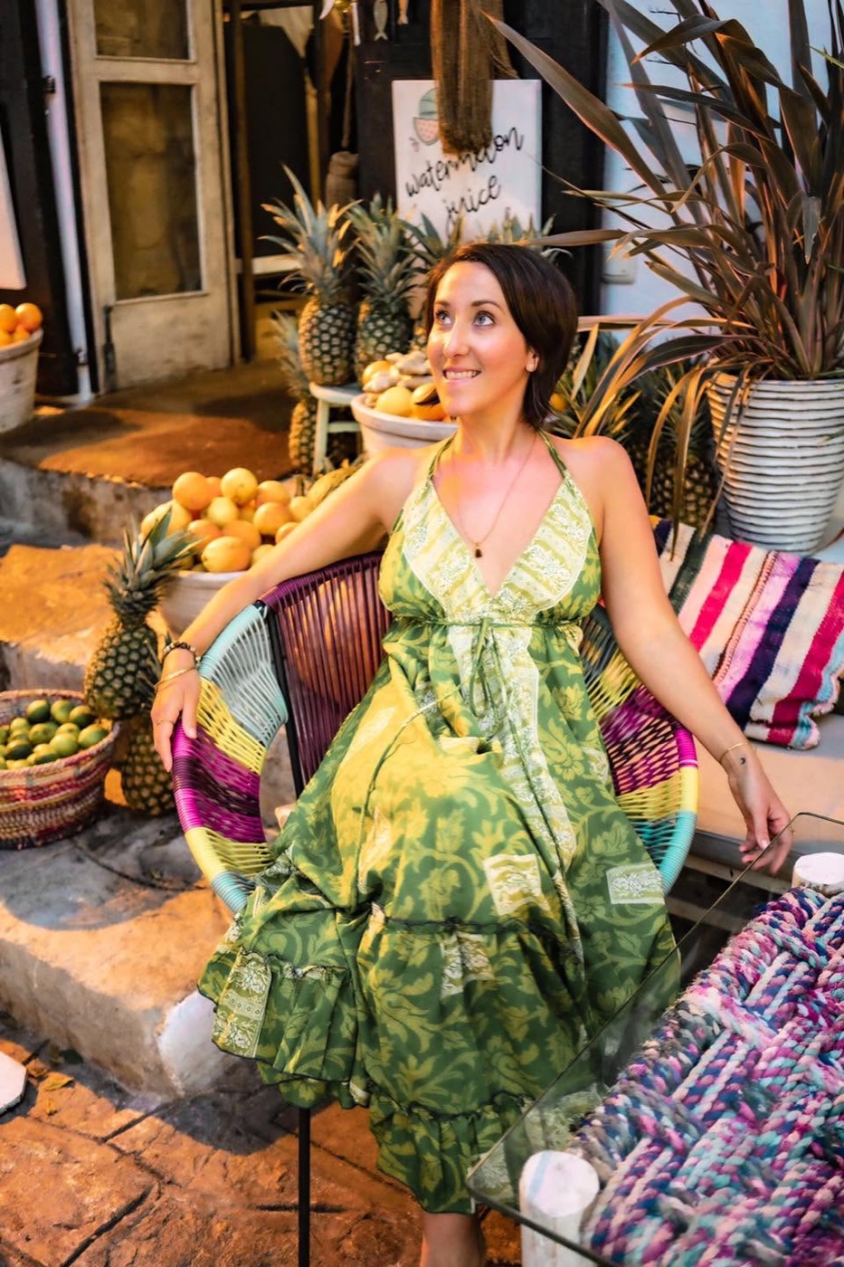 Jodie Louise sitting outside a juice bar in Ibiza